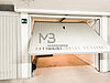 Garage mit E-Ladestation - box con colonnina elettrica