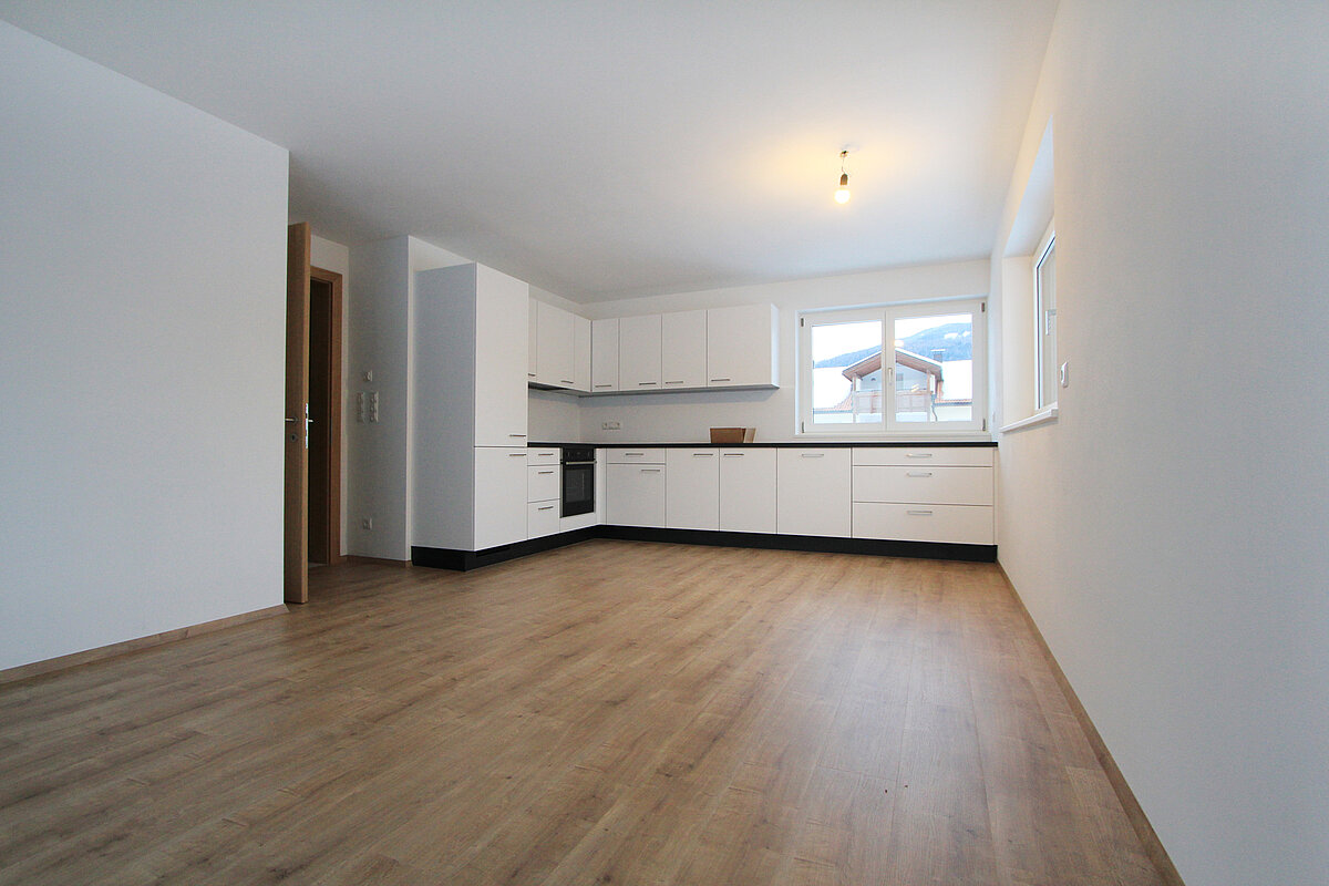 soggiorno con angolo cottura