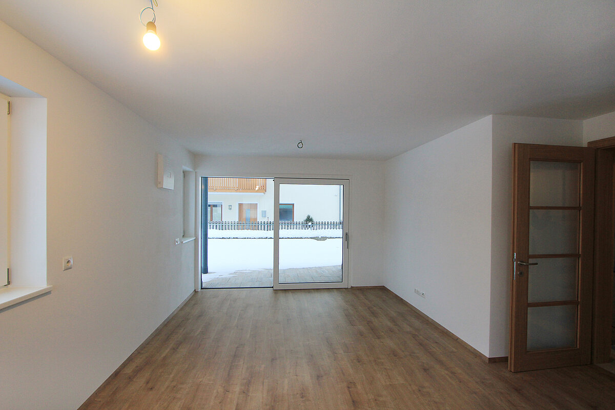 soggiorno con angolo cottura